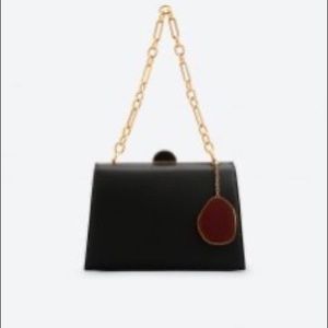 Charles & Keith cross boy purse